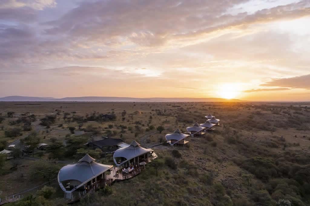 Aerial view of Mahali Mzuri Safari Camp nestled in Kenya’s Olare Motorogi Conservancy, surrounded by vast savannah and wildlife-rich landscapes